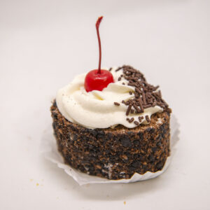 Kirsch soaked sponge, cherries and fresh whipped cream topped with chocolate sprinkles.